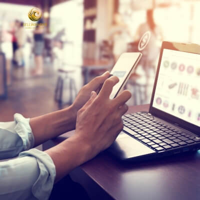 About Sellwander - A customer shopping on phone and laptop